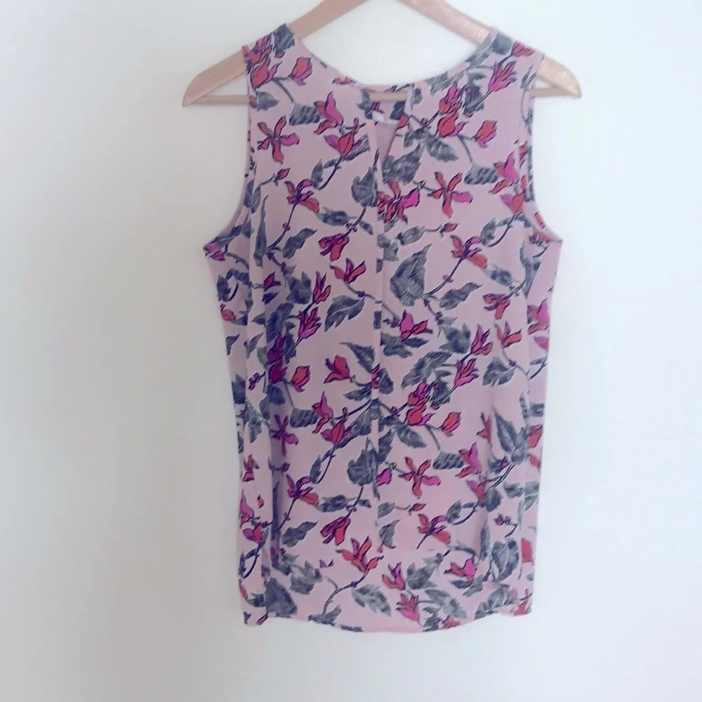 Pink floral lightweight sleeveless top. Triangle cutout at neckline. Medium - Picture 1 of 5